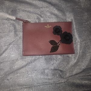 Kate Spade Burgundy Clutch with Black Floral Accent